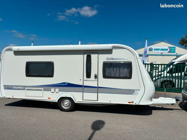 Caravane hobby 540 prestige - deplace caravane - lits jumeaux - salon en u - store banne et parois laterales